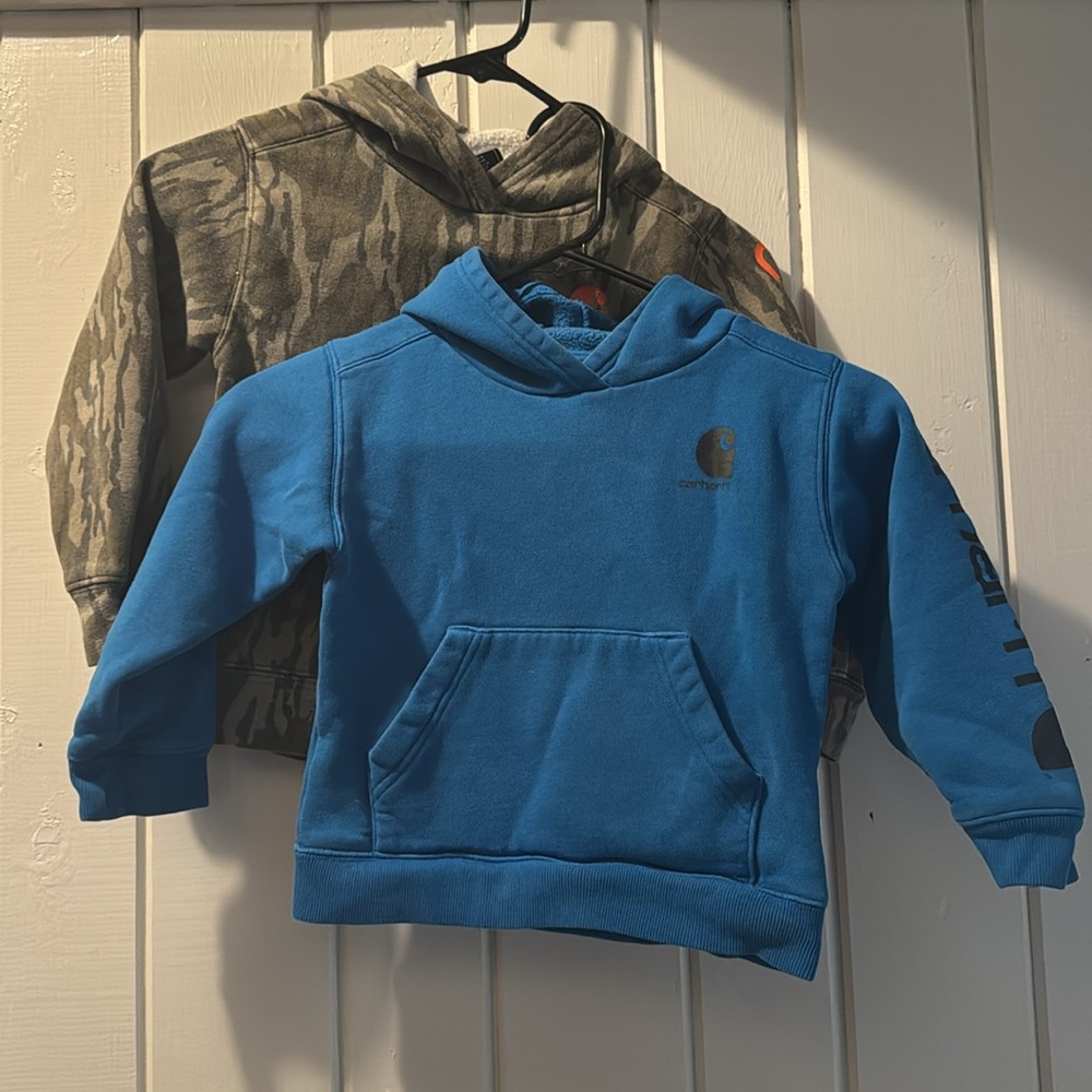(2) Boys size 4 Carhartt camo and blue hoodies